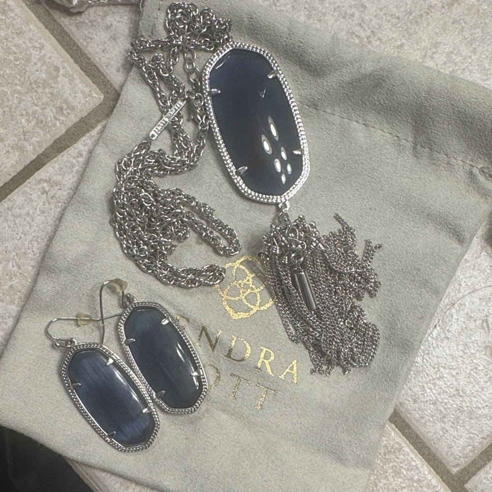 Worn once! Kendra Scott Dark blue and silver necklace and earrings matching set.